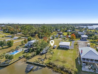 IMPROVED PRICE! This waterfront lot offers the best of either - photo 11