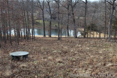 Discover this ready-to-build lot overlooking a peaceful pond - photo 3