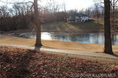 Discover this ready-to-build lot overlooking a peaceful pond - photo 5