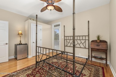 This stunning home is located in the highly desirable gated