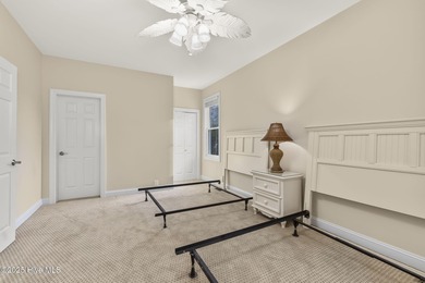 This stunning home is located in the highly desirable gated