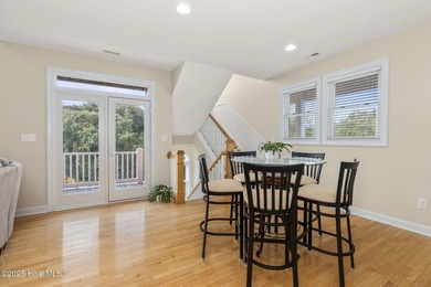 This stunning home is located in the highly desirable gated