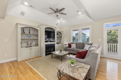 This stunning home is located in the highly desirable gated