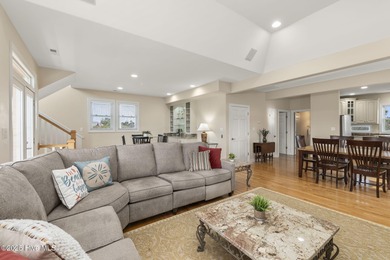 This stunning home is located in the highly desirable gated