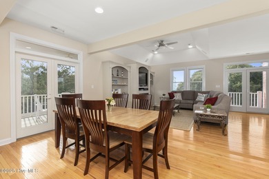 This stunning home is located in the highly desirable gated