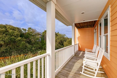 This stunning home is located in the highly desirable gated