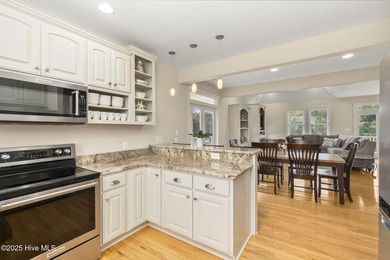 This stunning home is located in the highly desirable gated