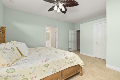 This stunning home is located in the highly desirable gated