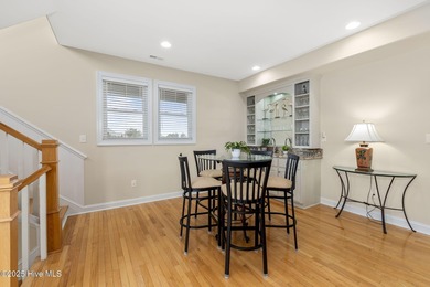 This stunning home is located in the highly desirable gated