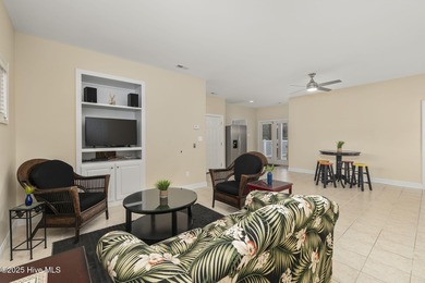 This stunning home is located in the highly desirable gated