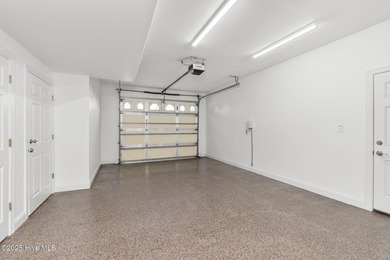 This stunning home is located in the highly desirable gated