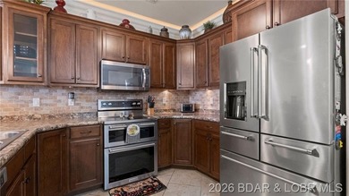 Welcome in to this spacious 3BR, 2BA walk-out level condo in