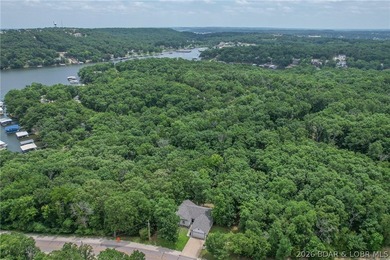 1.62-acre wooded lot in the sought-after Four Seasons community - photo 24
