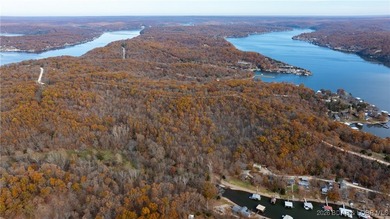 Interested in having BOTH acreage AND lake? This property - photo 2