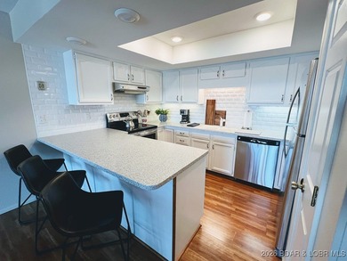 Discover your dream getaway at Lake Ozark! This spacious - photo 5