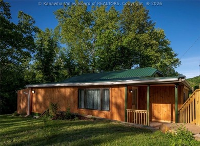 River life meets everyday comfort in this charming home nestled - photo 1