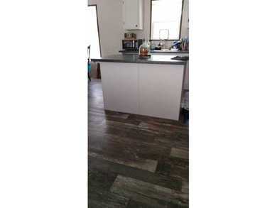 Welcome to a beautifully crafted residence, built in 2022, where - photo 8