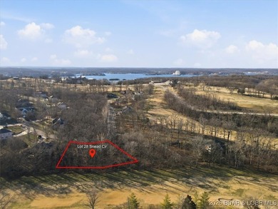 Nestled in the heart of the Village of Four Seasons, this - photo 5