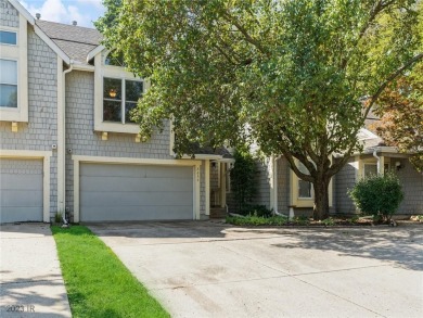 Lake Townhome/Townhouse Off Market in Urbandale, Iowa