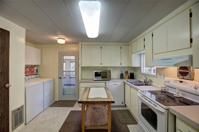 This home is an upgraded modular on a walk-out basement. Seller - photo 21