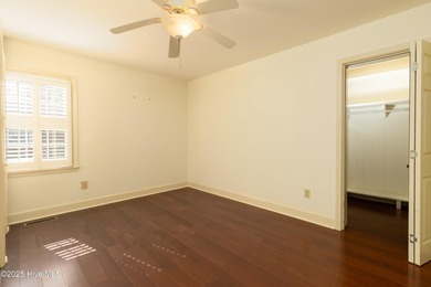 This charming brick ranch stands out on its corner lot within