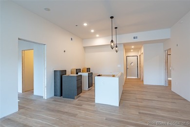 Experience refined lakefront living in this brand-new