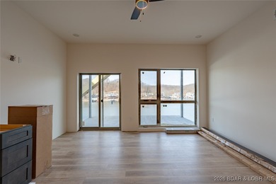 Experience refined lakefront living in this brand-new