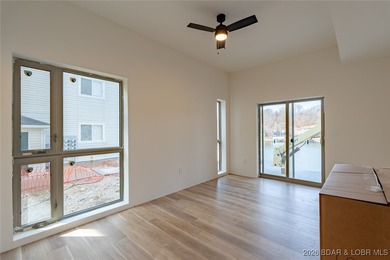 Experience refined lakefront living in this brand-new