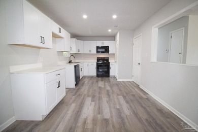 This adorable brick home offers 4 bedrooms and 2 full bathrooms - photo 8