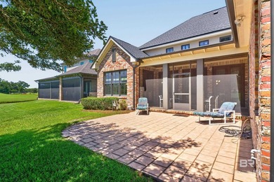 Fairway and water views complement this 2,358-square-foot brick - photo 11