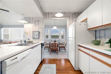 Turn-key lake living with an unbeatable location by both land - photo 11