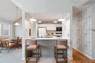Turn-key lake living with an unbeatable location by both land - photo 13