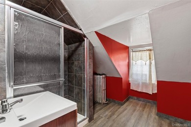 Welcome to 2281 Loring Place North, a spacious two-family home - photo 16