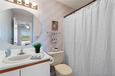 Turn-key lake living with an unbeatable location by both land - photo 24