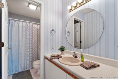 Turn-key lake living with an unbeatable location by both land - photo 25
