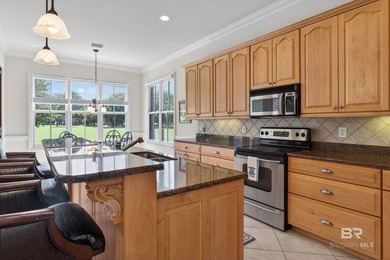 Fairway and water views complement this 2,358-square-foot brick - photo 26