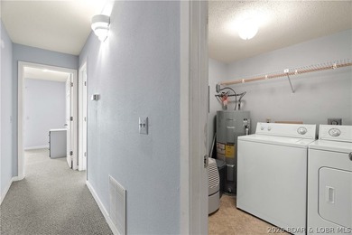 Turn-key lake living with an unbeatable location by both land - photo 26