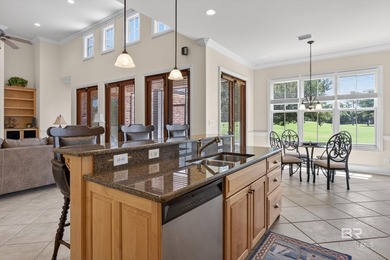 Fairway and water views complement this 2,358-square-foot brick - photo 27