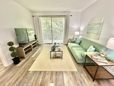 Welcome to this turnkey third-floor condominium with all the - photo 1