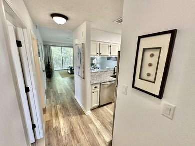 Welcome to this turnkey third-floor condominium with all the - photo 2