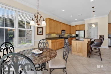 Fairway and water views complement this 2,358-square-foot brick - photo 33
