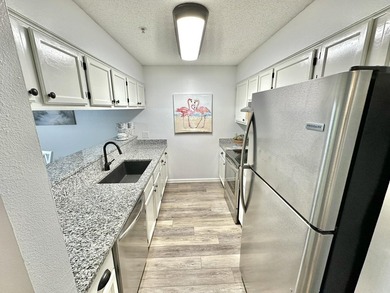 Welcome to this turnkey third-floor condominium with all the - photo 3