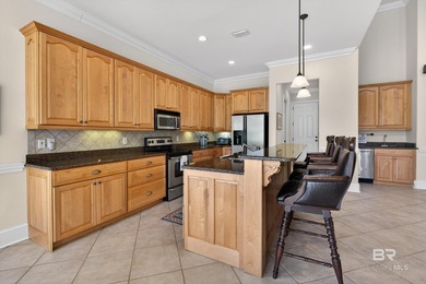 Fairway and water views complement this 2,358-square-foot brick - photo 34