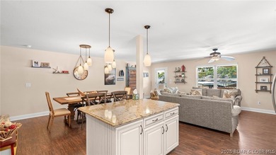 Designed with gathering in mind, this unique lake home was - photo 11