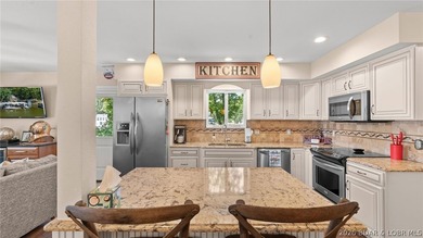 Designed with gathering in mind, this unique lake home was - photo 13