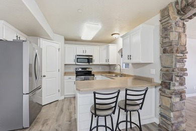 This bright and inviting 3-bedroom, 2-bathroom condo offers the - photo 13