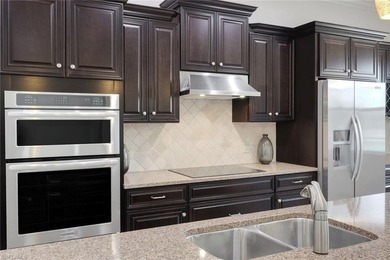 Experience elevated lakefront living in The Quarry with this - photo 14