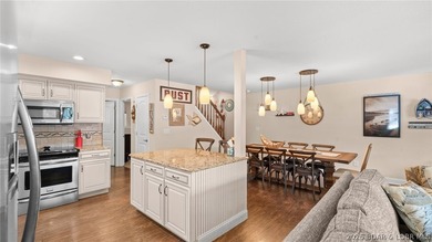 Designed with gathering in mind, this unique lake home was - photo 15