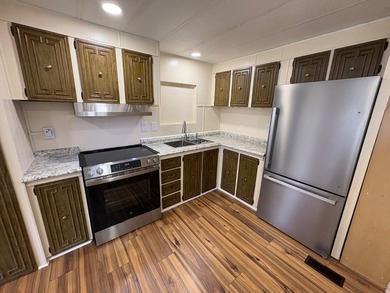 COMPLETLEY REMODELED INSIDE!!! Candlelight Manor offers a - photo 5