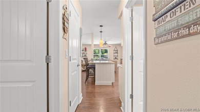 Designed with gathering in mind, this unique lake home was - photo 16